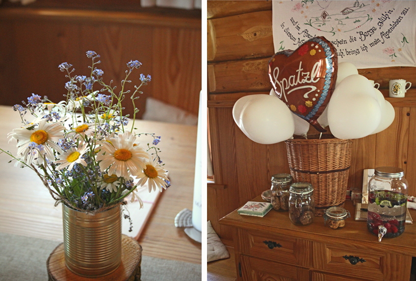 Wildblumen, Blechdosen-Vasen, Einmachgläser und viele Holz-Elemente zur Taufe im Landhausstil